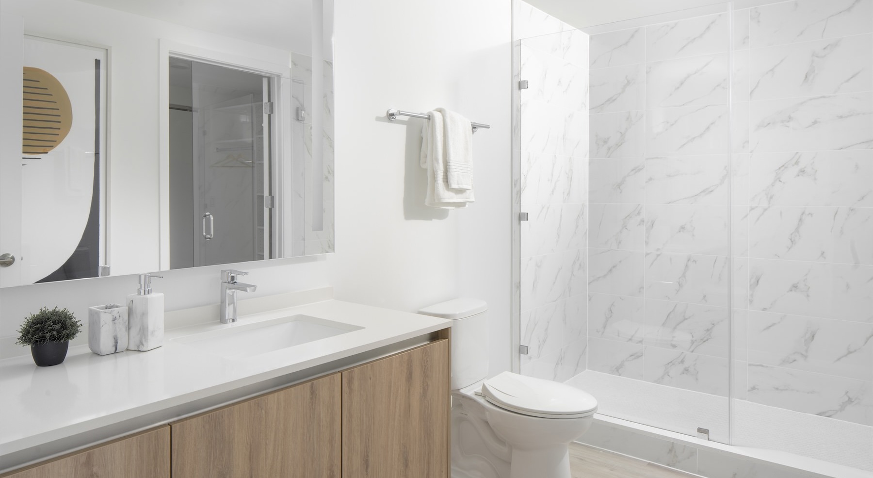 bathroom with a large sink and mirror