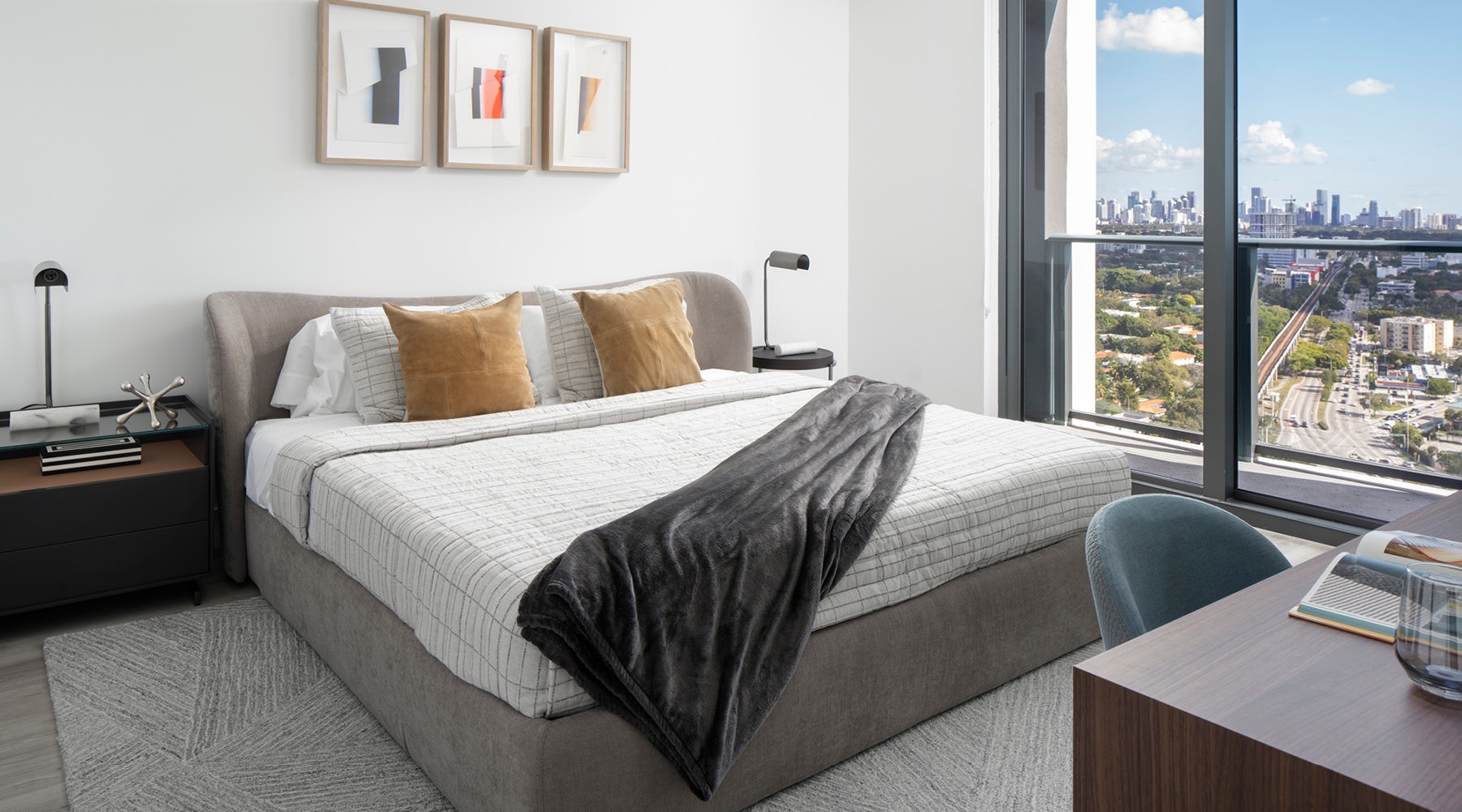 Bedroom options to fit every lifestyle a bed in a room with side tables and a large window